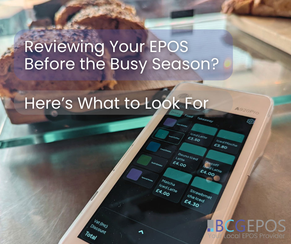 Hospitality EPOS system in a busy restaurant with touchscreen terminal and handheld ordering device during peak service.