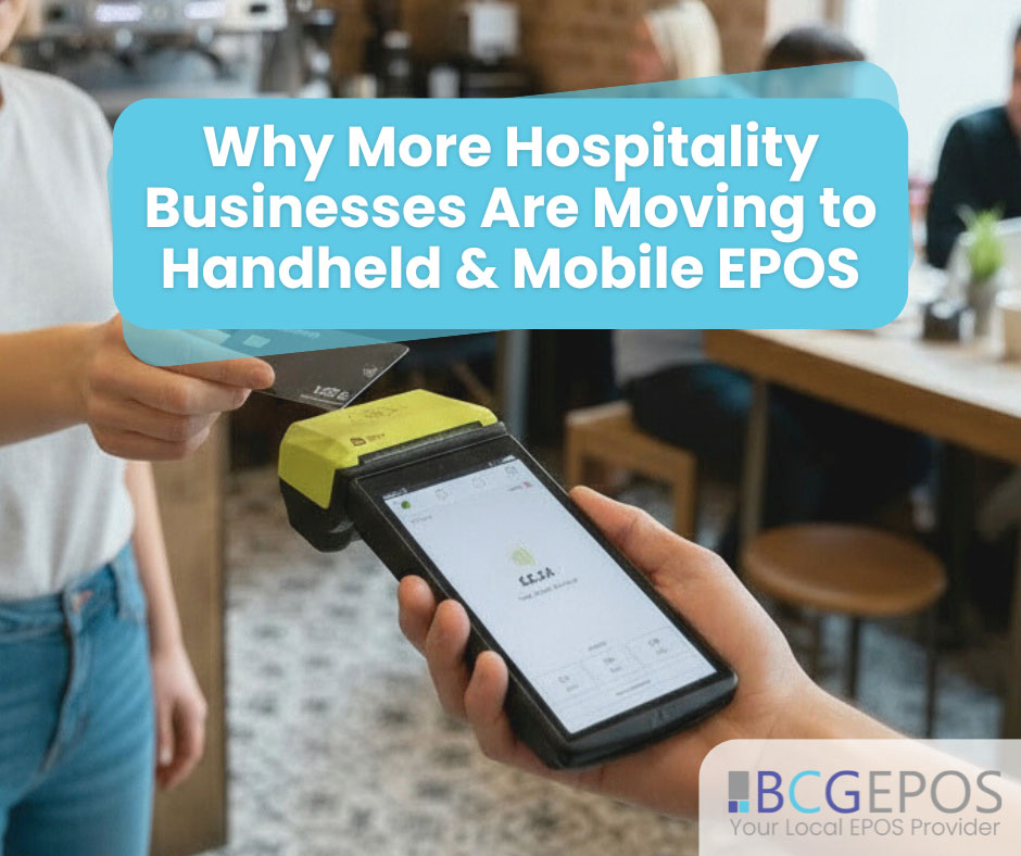 Hospitality staff using handheld mobile EPOS device to take orders and process payment at a restaurant table.