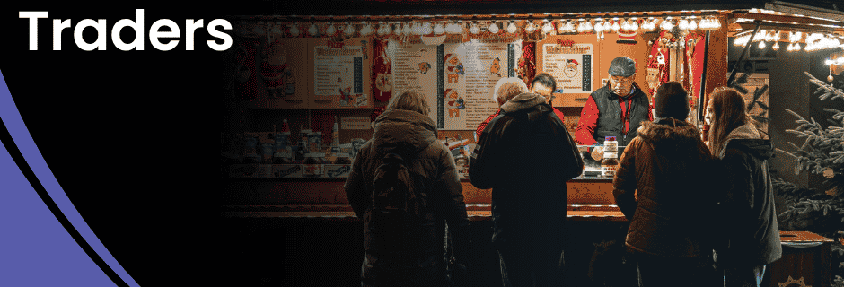 EPOS for pop-ups at a Christmas market with portable till and card payment terminal serving customers at a seasonal food stall.